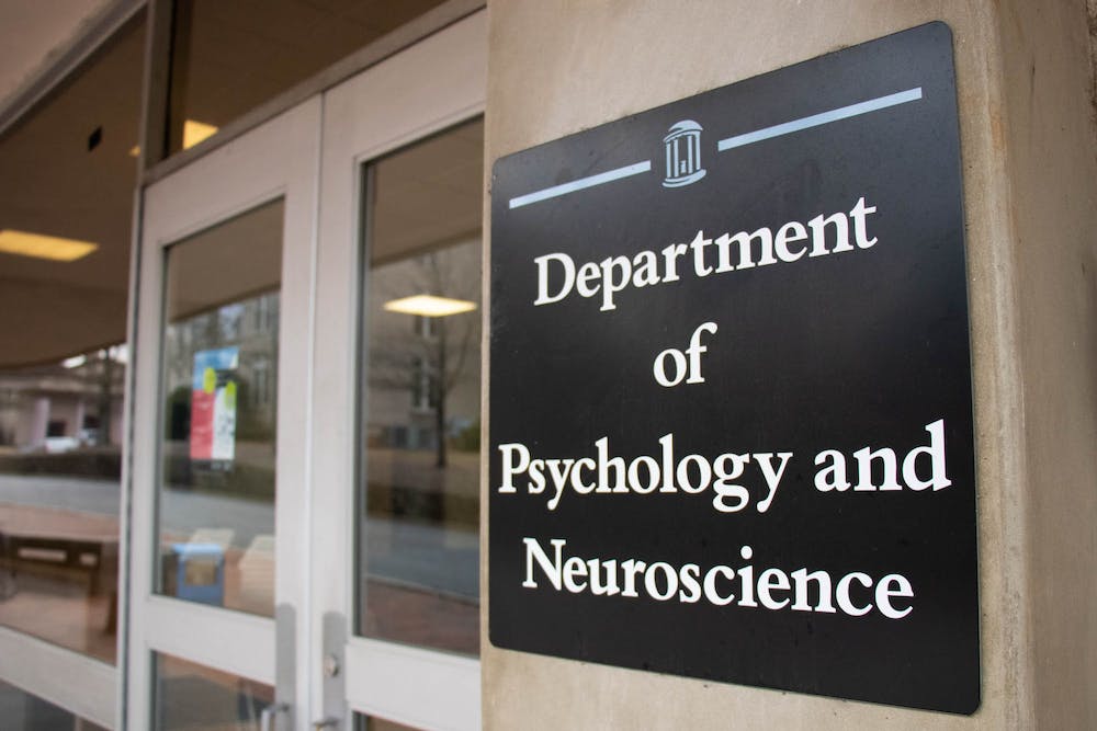 Department of Psychology and Neuroscience sign near a door